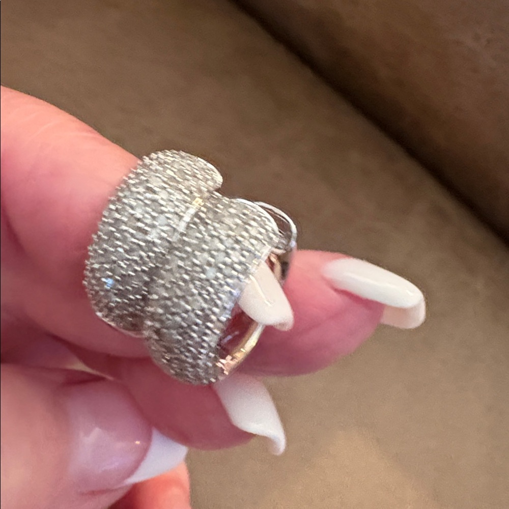 Elegant 14kt white gold diamond Huggies.
